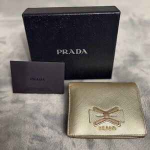 Prada Metallic Gold Bifold Wallet with Bow Accent